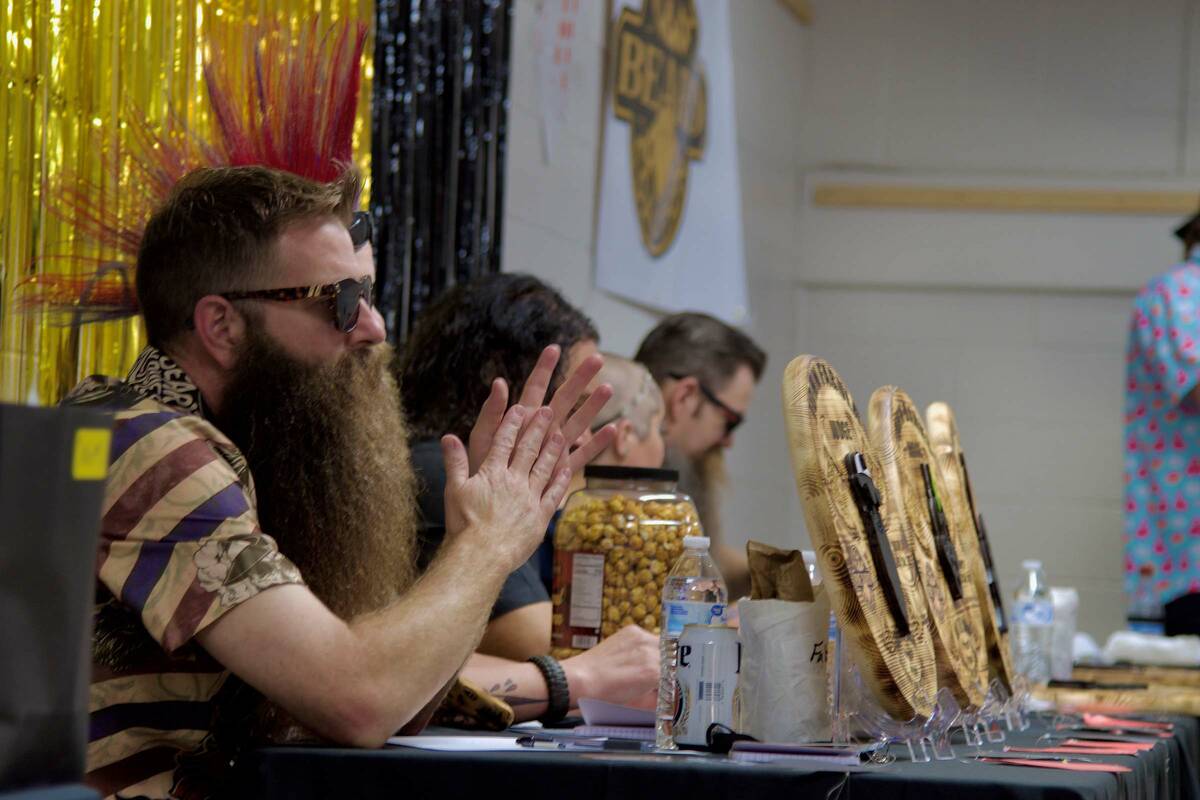 The judges get ready to judge at the Mustache and Beard Contest. (Jimmy Romo/Pahrump Valley Times)
