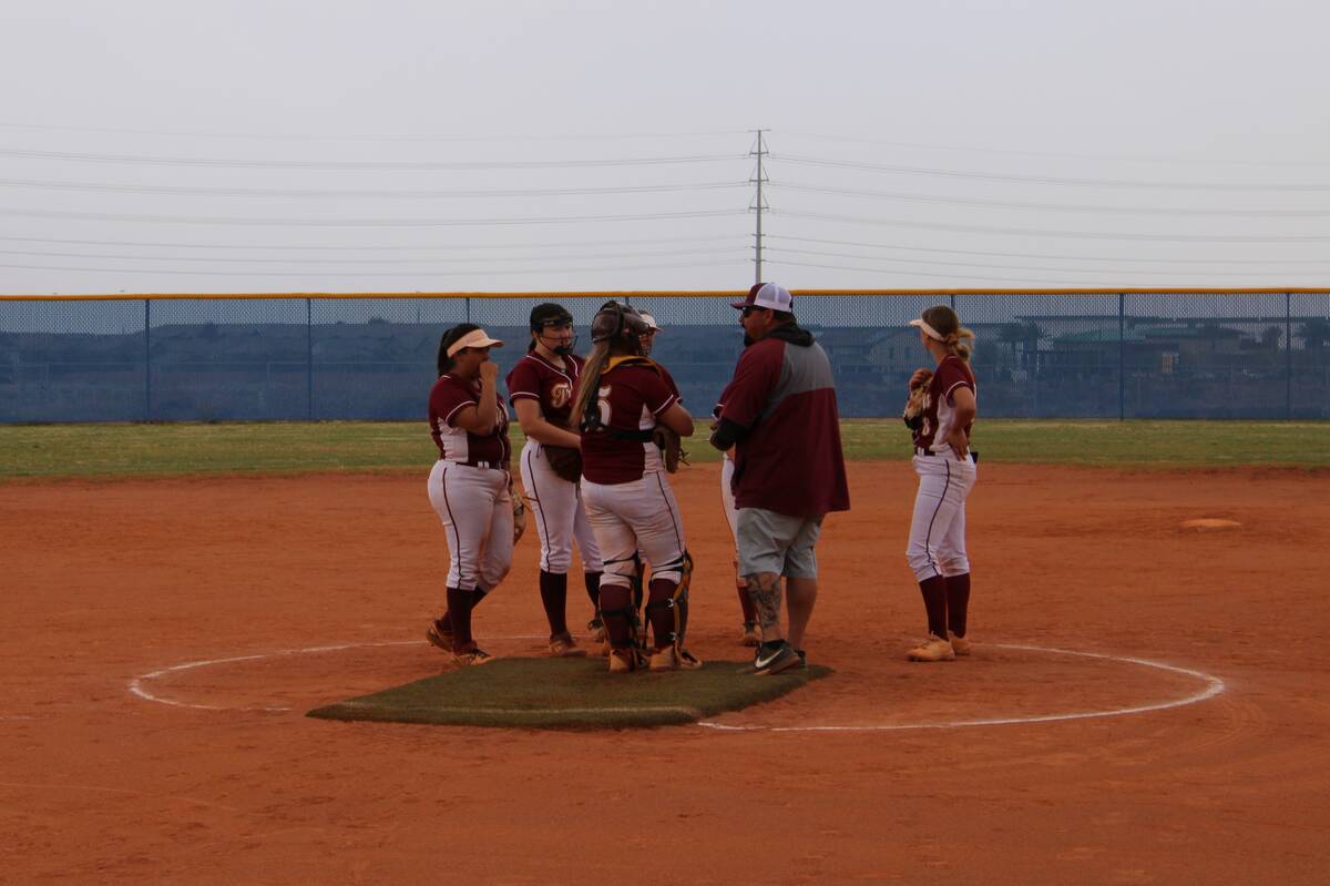 Danny Smyth/Pahrump Valley Times A team meeting at the mound for the Lady Trojans as head coach ...