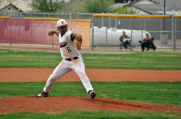 Horace Langford Jr./Pahrump Valley Times Senior pitcher Henry Amaya gets ready to deliver a pi ...