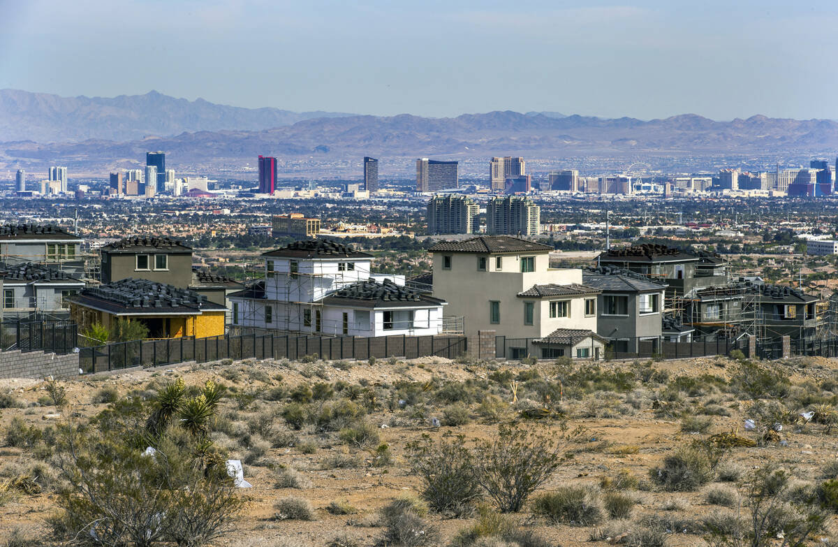 New homes under construction near West Reedpoint Drive and Desert Foothills Drive on Wednesday, ...