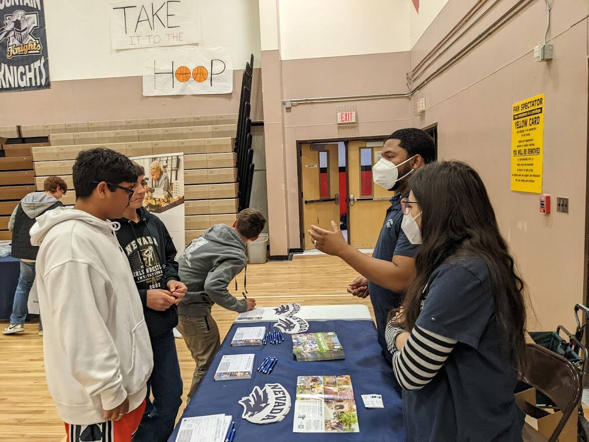 Tonopah eighth-graders Rajpeet Chahal and Remington Cobb talk with Elizabeth Nubel and Quentin ...