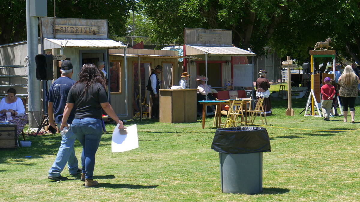 Special to the Pahrump Valley Times Wild West Extravaganza attendees stroll around the park wit ...