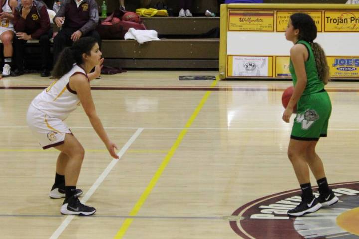 Danny Smyth/Pahrump Valley Times Senior guard Heliane Sutton (11) defending against a Virgin Va ...