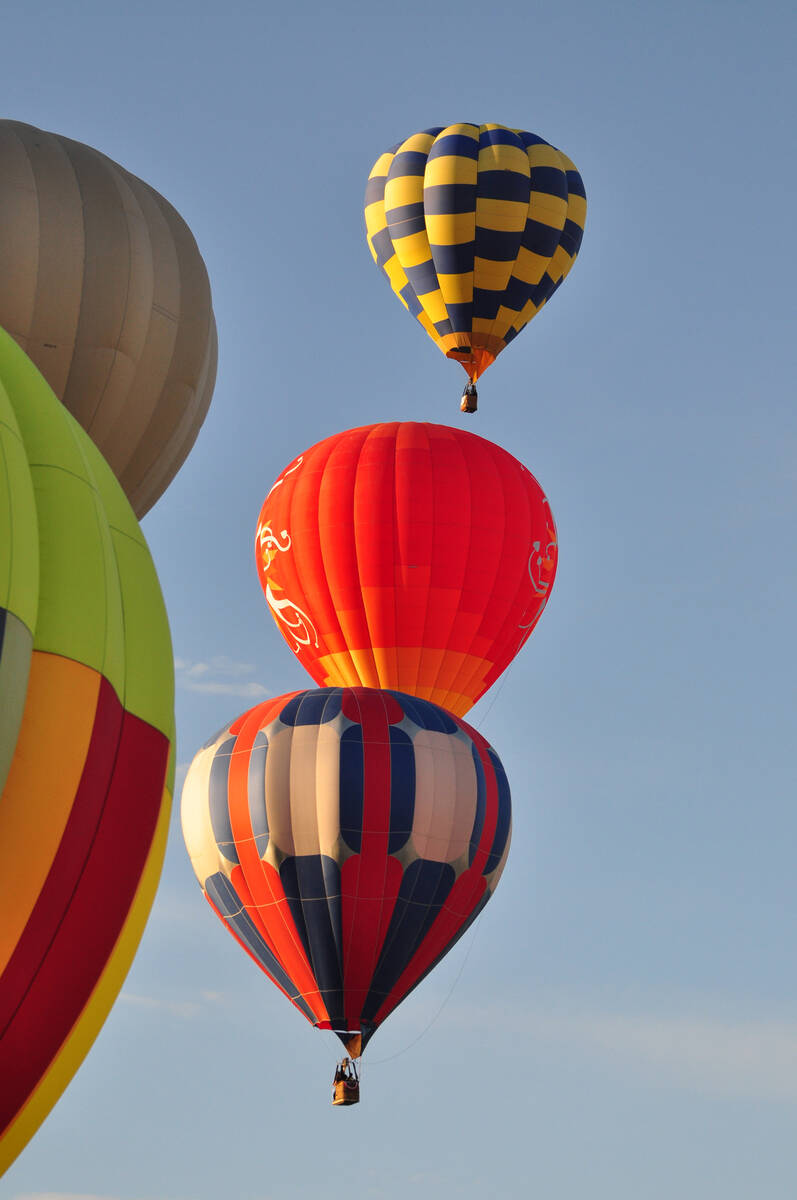 Horace Langford Jr / Pahrump Valley Times Hot air balloons drift skyward during a previous Bal ...