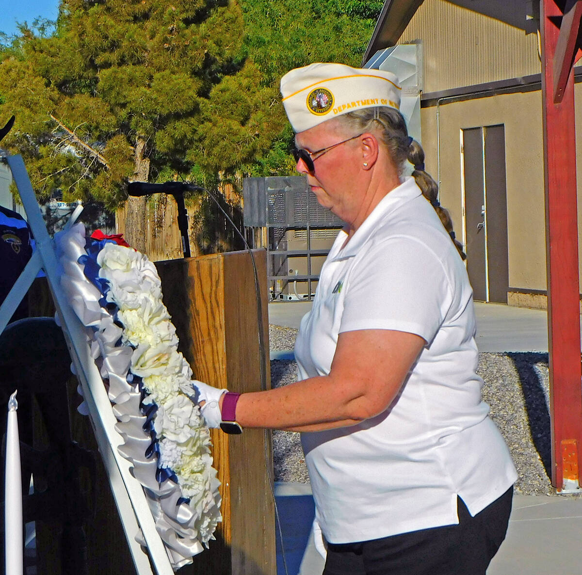 Robin Hebrock/Pahrump Valley Times DAV Nevada State Commander Cathy Girard is pictured placing ...