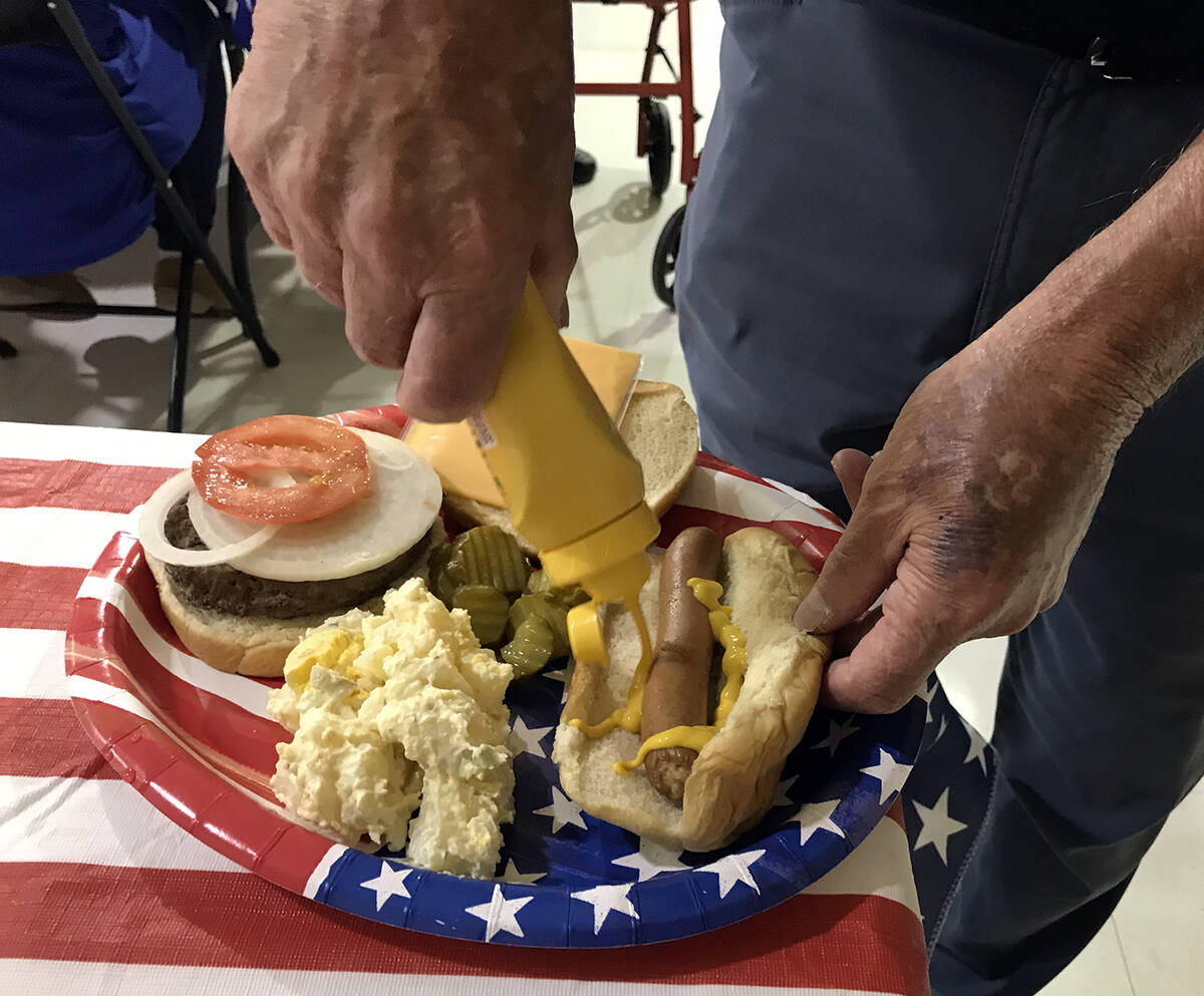 Robin Hebrock/Pahrump Valley Times A loaded plate is made complete with a squirt of mustard at ...