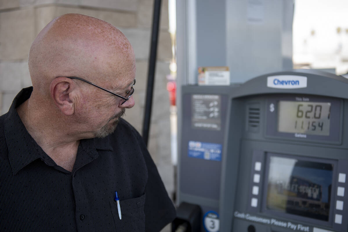 David Stubblefield, of Bakersfield, California, pumps gas at a Chevron station on East Fremont ...