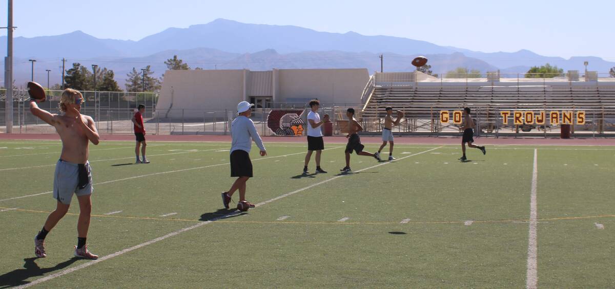 Danny Smyth/Pahrump Valley Times The Pahrump Valley Trojans work on light catching drills afte ...