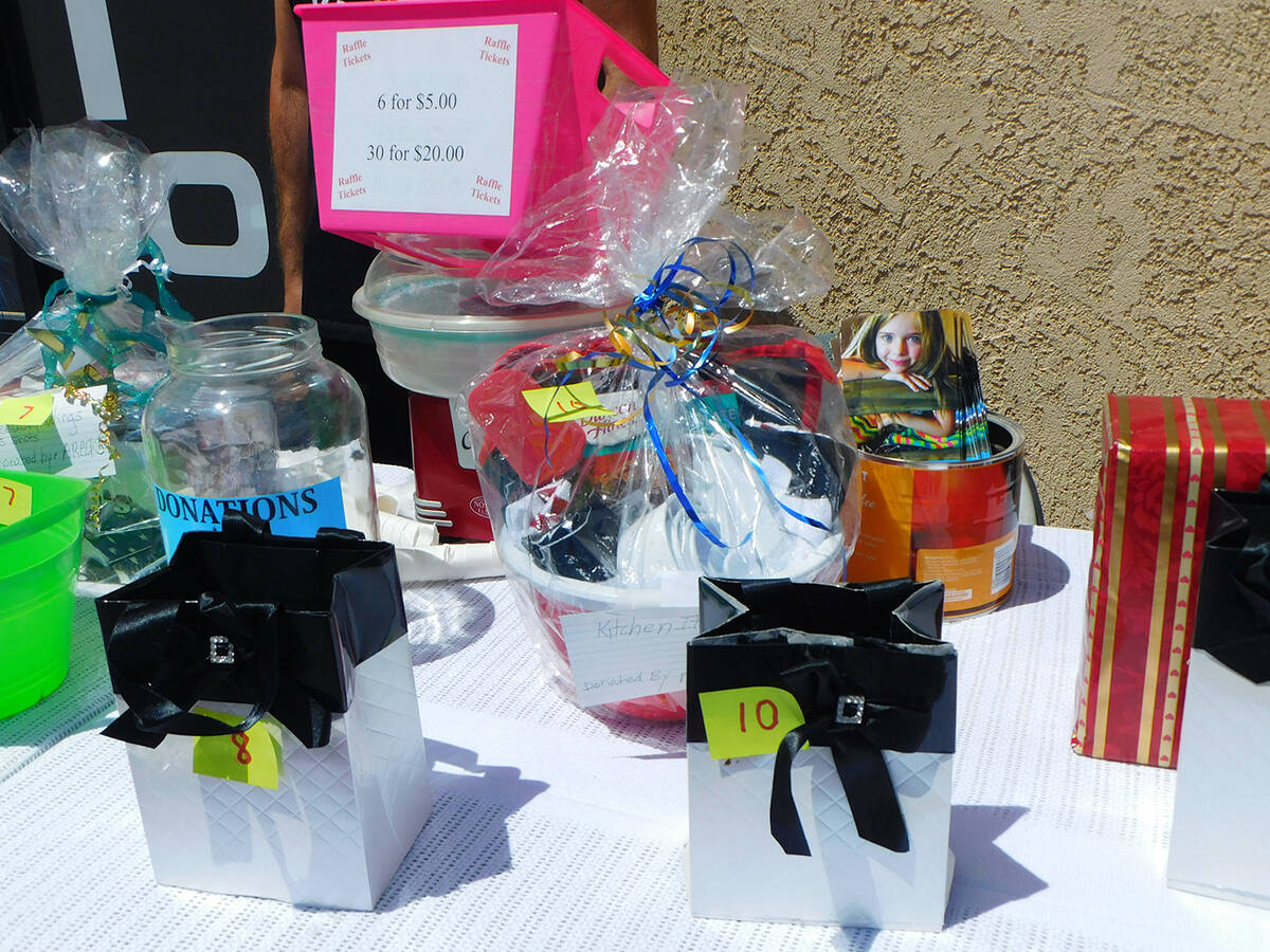 Robin Hebrock/Pahrump Valley Times In addition to the car wash, there were raffle prizes up for ...