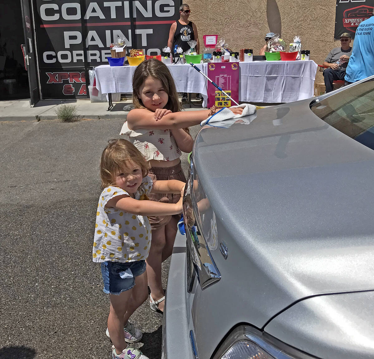 Robin Hebrock/Pahrump Valley Times Two youngsters help with the Sleep in Heavenly Peace Donatio ...