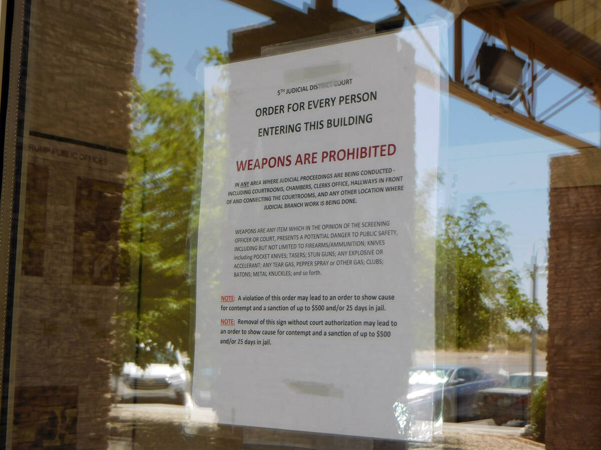 Robin Hebrock/Pahrump Valley Times This photo shows the "no weapons allowed" signage that is at ...
