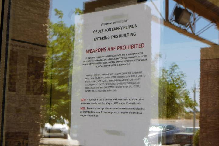 Robin Hebrock/Pahrump Valley Times This photo shows the "no weapons allowed" signage that is at ...