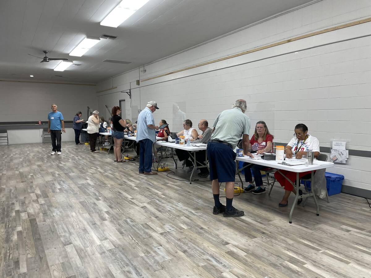 (Faye Burdzinksi/Pahrump Valley Times) Voters and poll workers on Tuesday, June 14 at the Bob ...