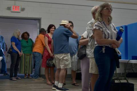 Voters in Pahrump's Bob Ruud Community Center in line to be next to cast their ballot in the 20 ...
