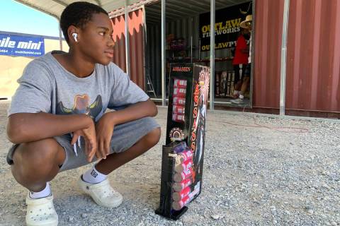 (Brent Schanding/Pahrump Valley Times) Jacobi Law shows off Assassin fireworks at Outlaw Pyro i ...