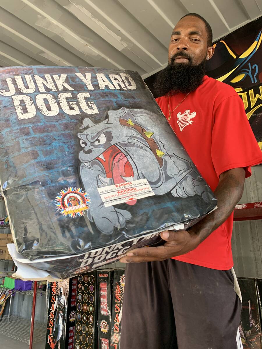 (Brent Schanding/Pahrump Valley Times) Mike Wiggins displays a box of Junk Yard Dogg fireworks ...