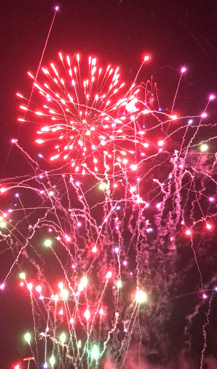 Robin Hebrock/Pahrump Valley Times Sparkling above a crowd of thousands, fireworks burst with c ...