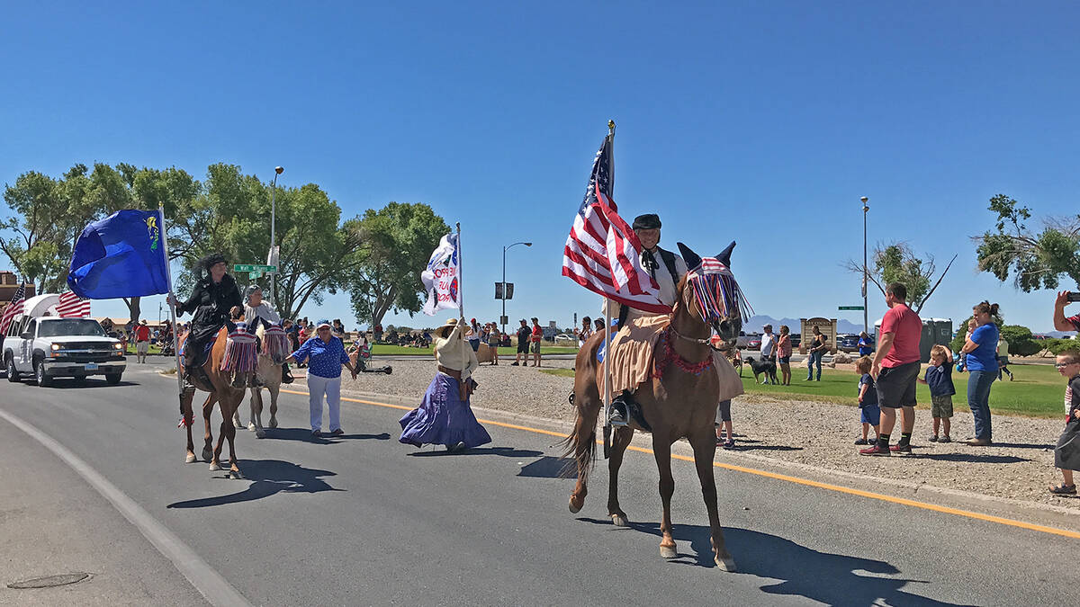 Robin Hebrock/Pahrump Valley Times It wouldn't be a parade without horses, who are shown making ...