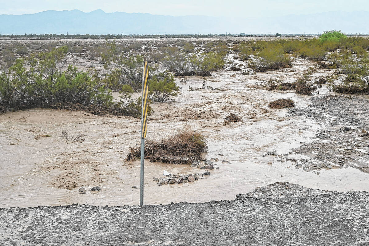 Flooding is seen in the area of Gamebird Road and state Route 160 in Pahrump on Sunday, July 31 ...
