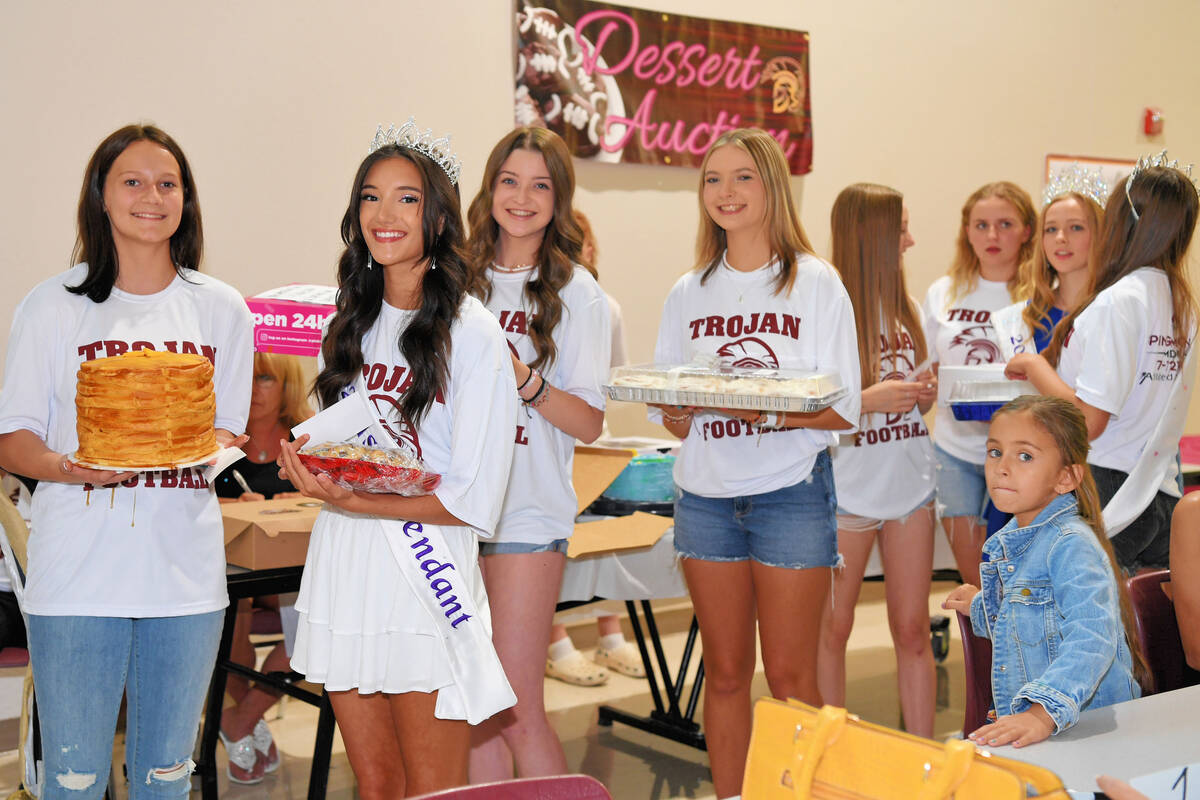 Peter Davis/Pahrump Valley Times The Pahrump Valley High School dance team helping out during ...