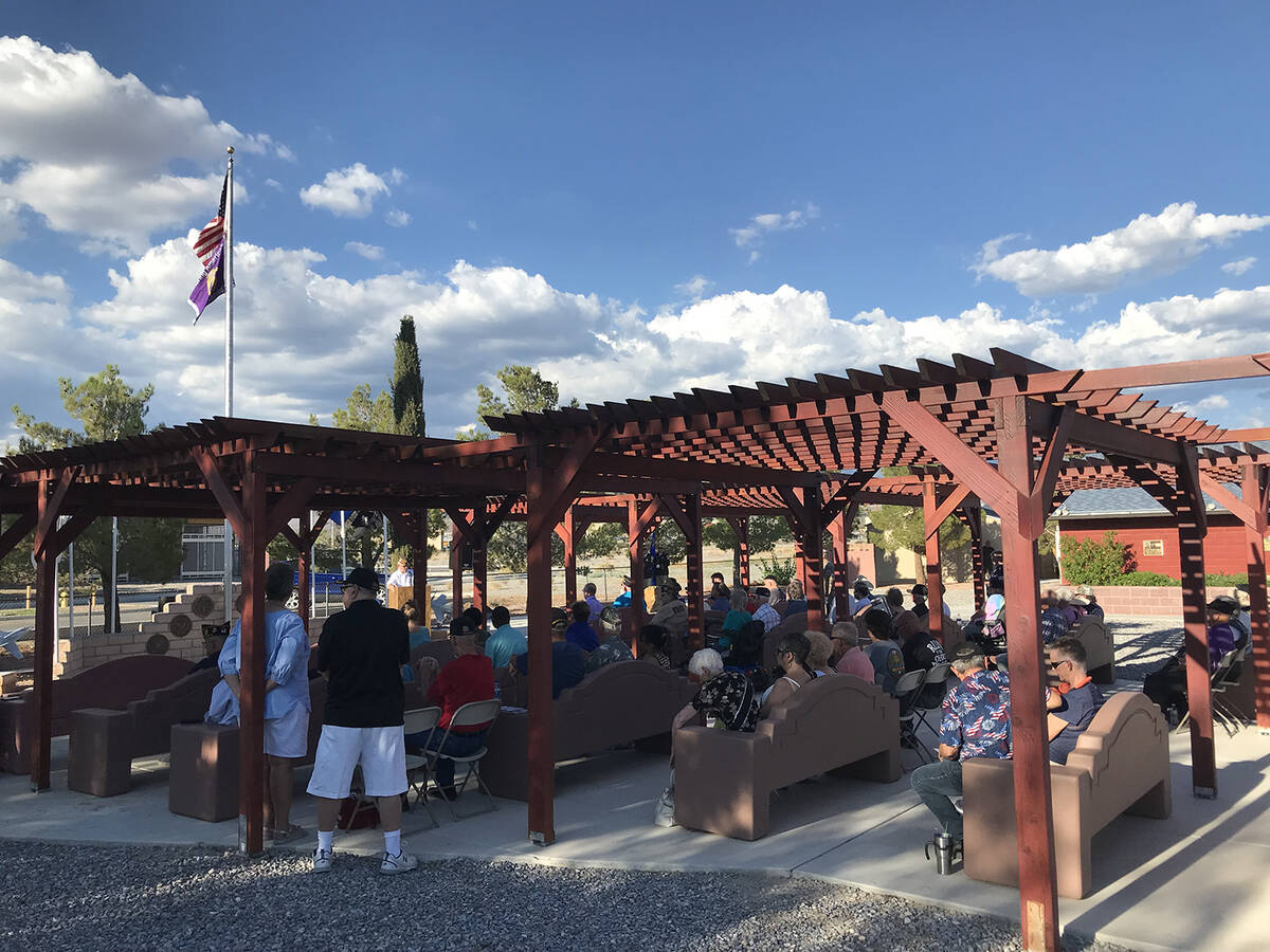 Robin Hebrock/Pahrump Valley Times A sizable crowd gathered under the pergola at the Pahrump Ve ...