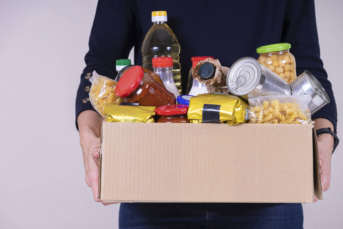 Getty Images Donations of nonperishable items such as pasta, canned meat and canned fruit, as w ...