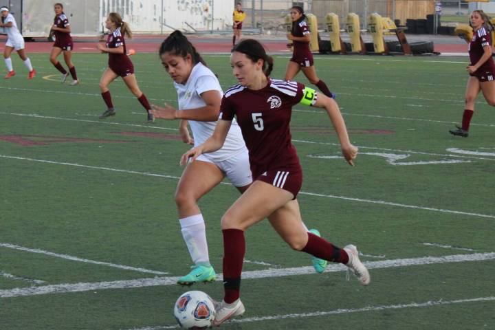 Danny Smyth/Pahrump Valley Times Pahrump Valley Trojans senior captain Adryanna Avena (5) drib ...