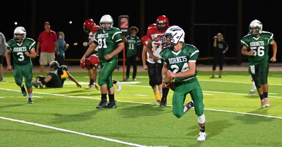 Richard Stephens/Special to the Times-Bonanza Effrain Moreno (24) runs for a touchdown in the ...