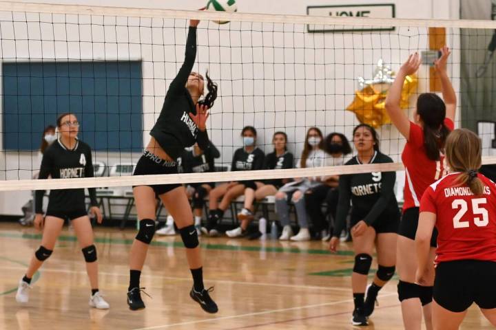 Richard Stephens/Special to the Times-Bonanza Emily Guevara (6) spikes the ball during Beatty' ...
