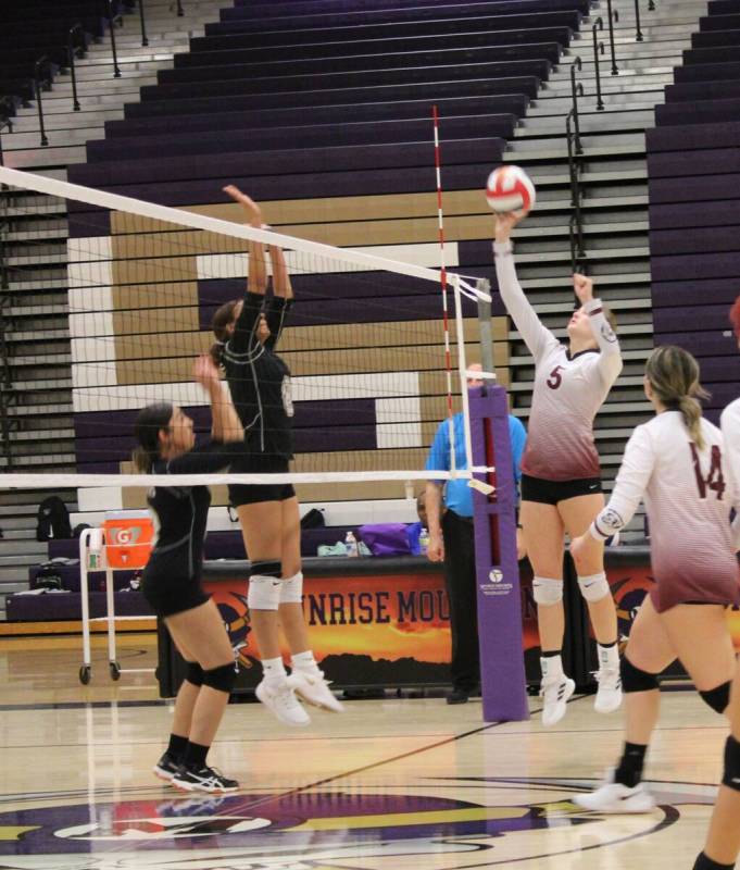 Danny Smyth/Pahrump Valley Times Senior captain Peyton Odegard (5) is skying high for a hit aga ...