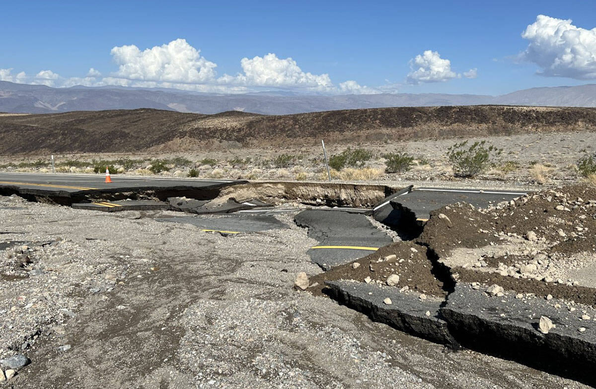 A damaged section of California Route 190 between Panamint Valley and Towne Pass on Sunday, Sep ...