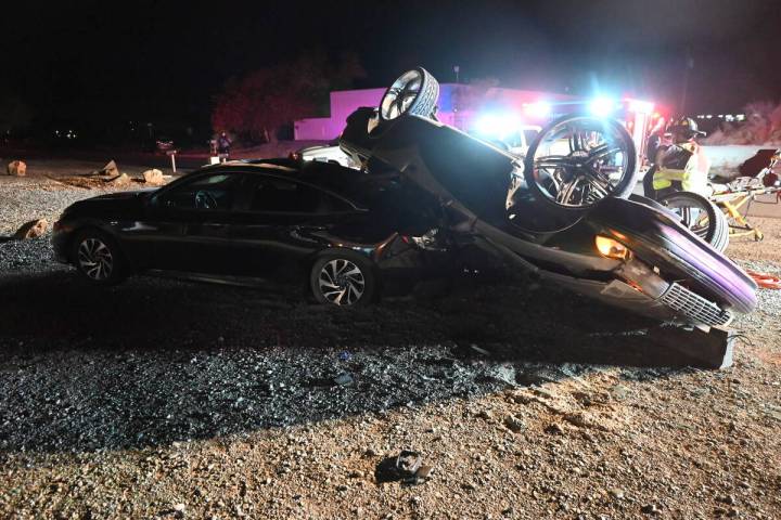 “One car was on top of another parked car and the car was resting on its passenger side. Crew ...
