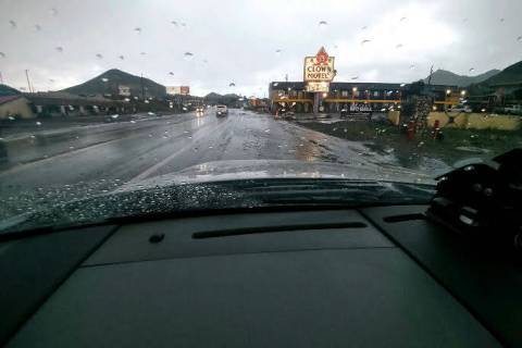 (Nye County Sheriff's Office) Debris from flash flooding partially closed North Main Street in ...