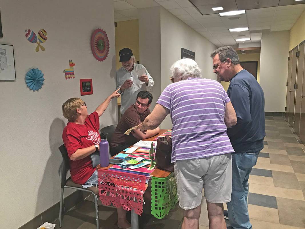 Robin Hebrock/Pahrump Valley Times Attendees are pictured purchasing their RAM Taco Dinner tickets.