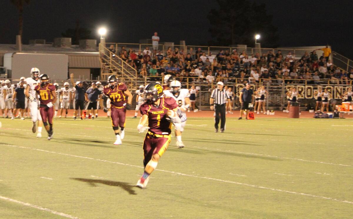 Danny Smyth/Pahrump Valley Times Junior running back Brennen Benedict (1) takes in a 12-yard p ...