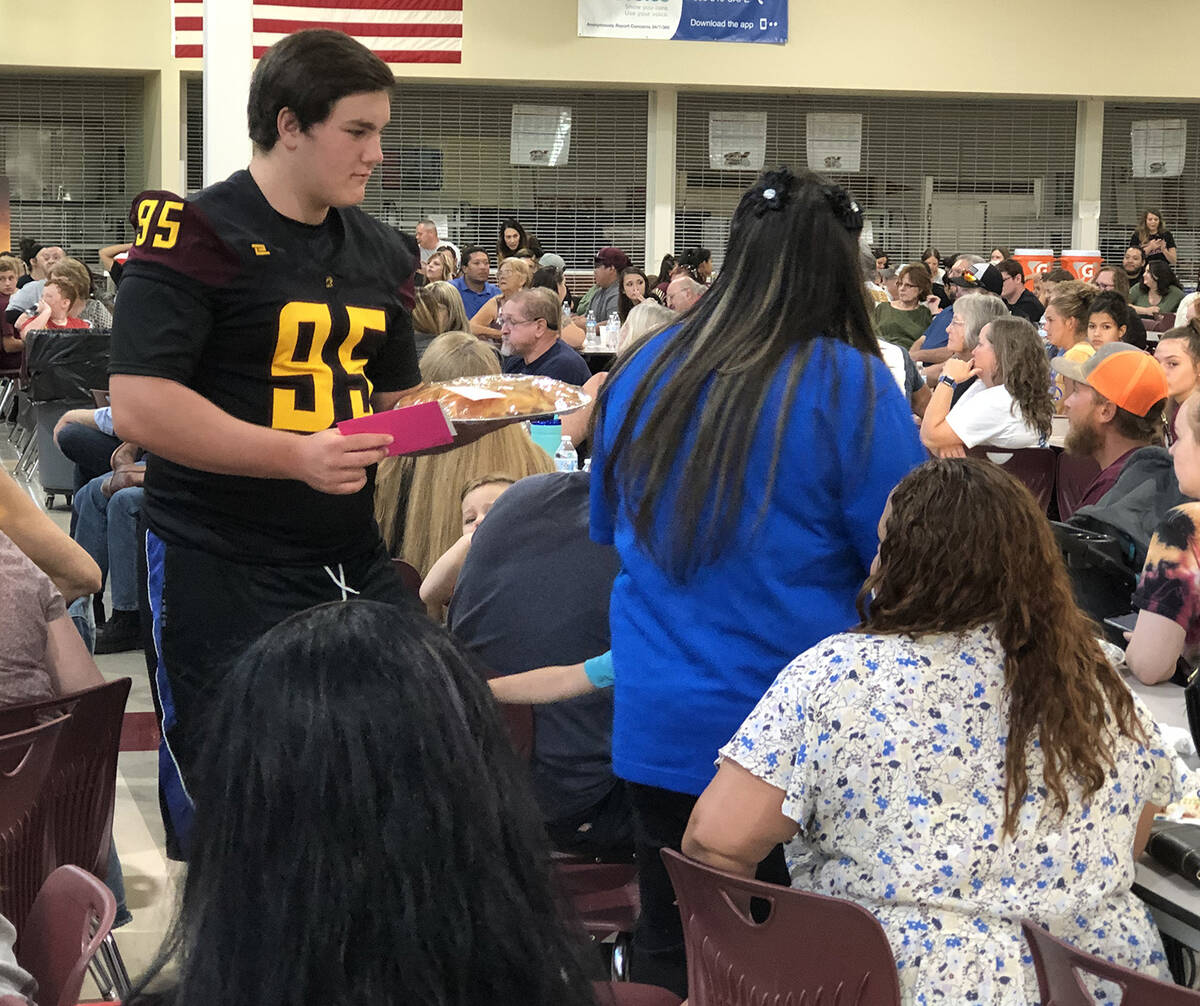 Pahrump Valley Times file photo Jared Mudge at a dessert auction at PVHS in 2019. Mudge passed ...