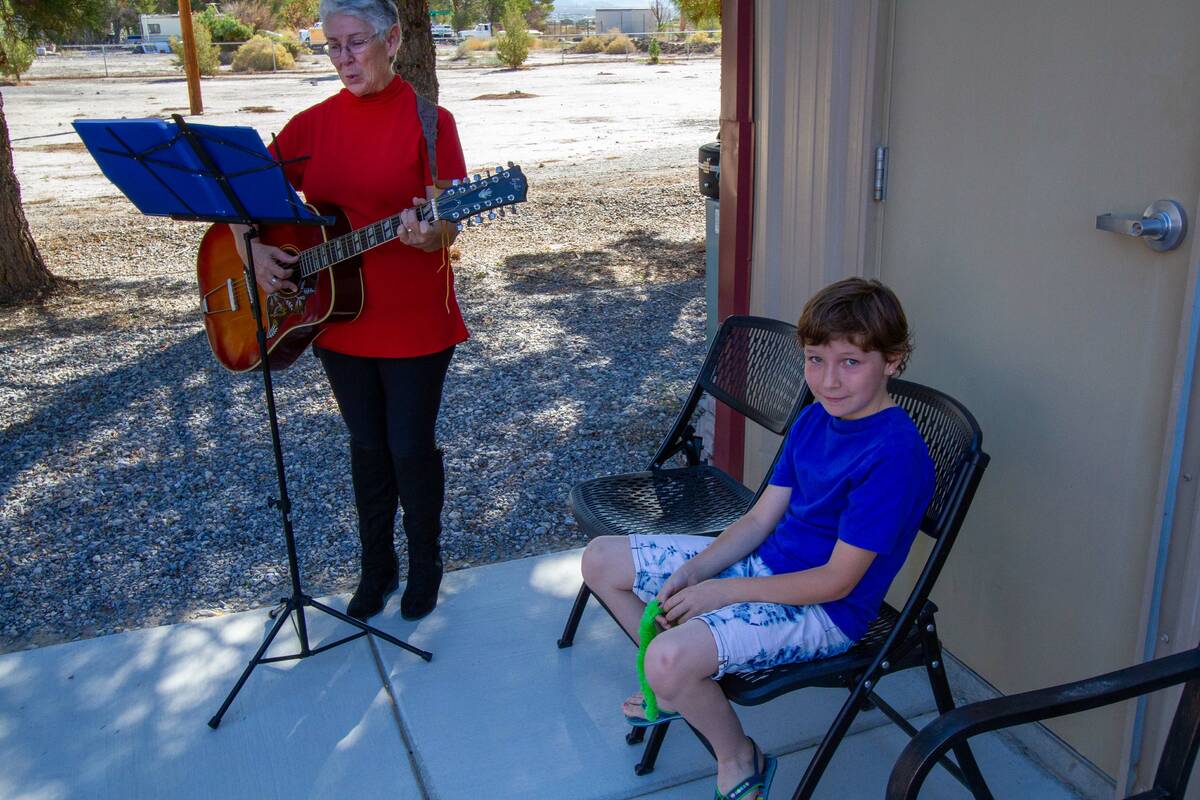 John Clausen/Special to the Pahrump Valley Times Lydia Wiltse, left, plays guitar, as Leah Wilt ...