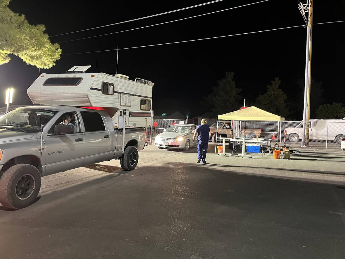 Special to the Pahrump Valley Times This photo shows vehicles entering the parking lot to wait ...