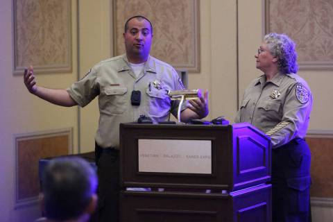 David Boruchowitz, left, and Nye County Sheriff Sharon Wehrly during the SHOT Show at the Sands ...