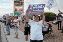 Horace Langford Jr./Pahrump Valley Times Supporters held signs at the 'Cops for Joe McGill" Ral ...