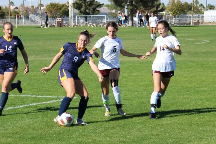 Danny Smyth/Pahrump Valley Times Senior forward Adryanna Avena (5) and junior forward Grace Mi ...