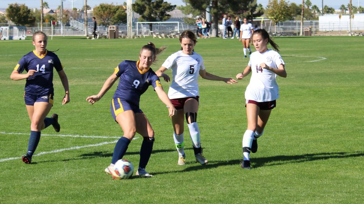 Danny Smyth/Pahrump Valley Times Senior forward Adryanna Avena (5) and junior forward Grace Mi ...