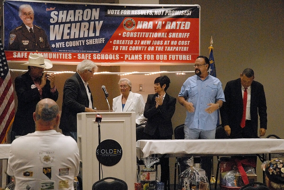 Horace Langford Jr./Pahrump Valley Times Sheriff Sharon Wehrly is greeted by applause from sup ...