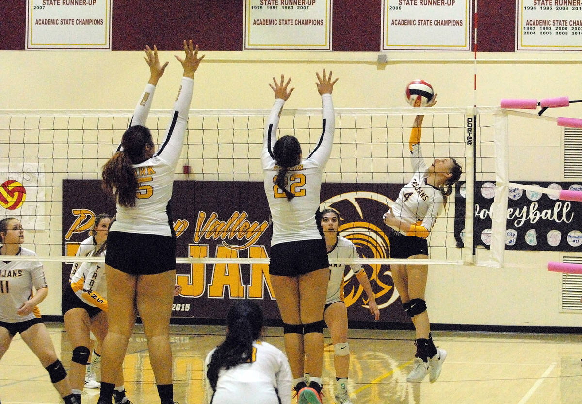 Horace Langford Jr./Pahrump Valley Times Senior hitter Asia Bibb (4) going for a kill in the Tr ...