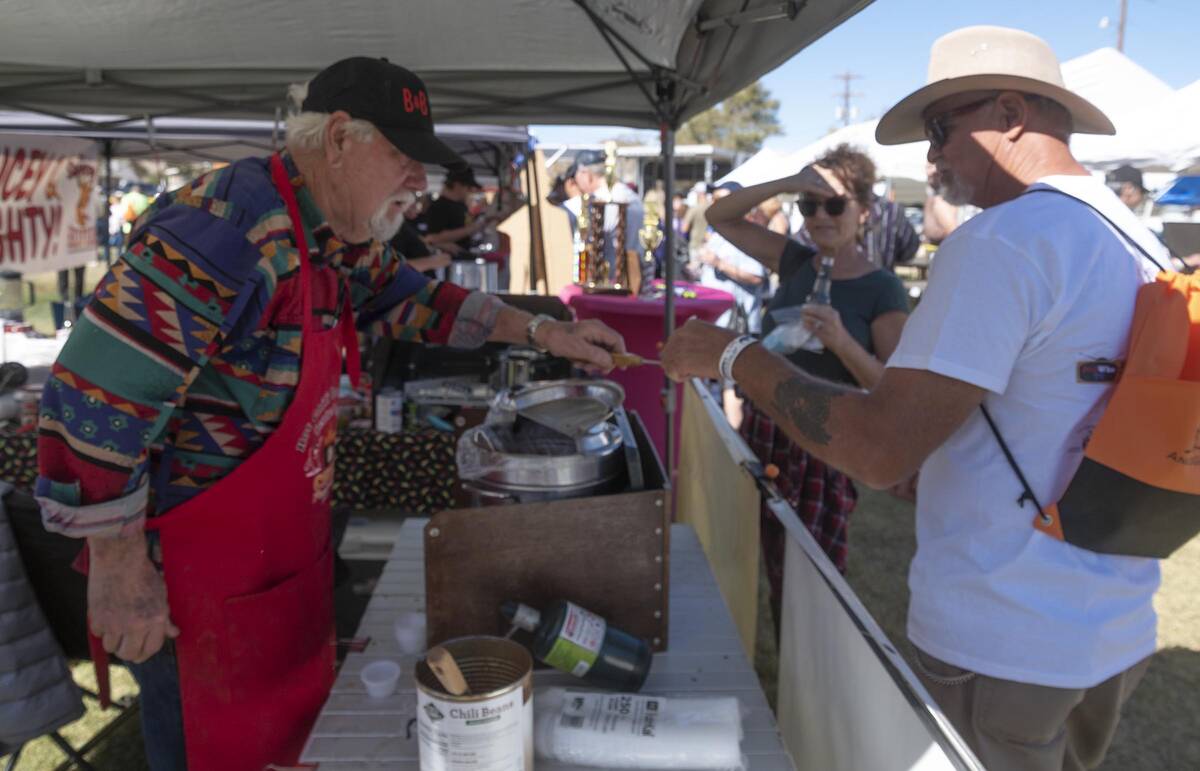 Richard Stephens/Special to the Pahrump Valley Times Beatty Days visitors enjoy tasting the chi ...
