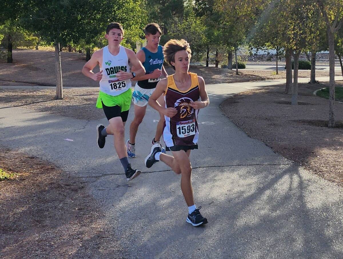 Danny Smyth/Pahrump Valley Times Freshman Timothy Stutzman tries to keep pace with the other r ...