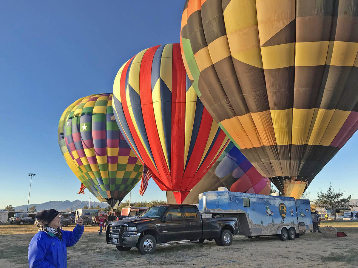 Robin Hebrock/Pahrump Valley Times This photo shows a Balloon Festival attendee capturing memor ...