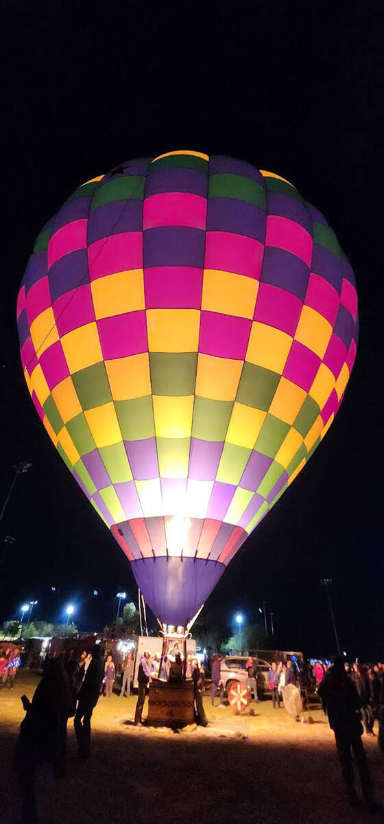 Brigitte Dubin/Special to the Pahrump Valley Times Balloon Festival attendees are pictured admi ...