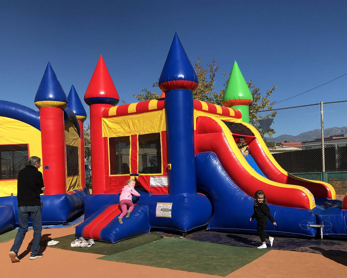 Robin Hebrock/Pahrump Valley Times Youngsters are pictured playing in one of the bounce houses ...
