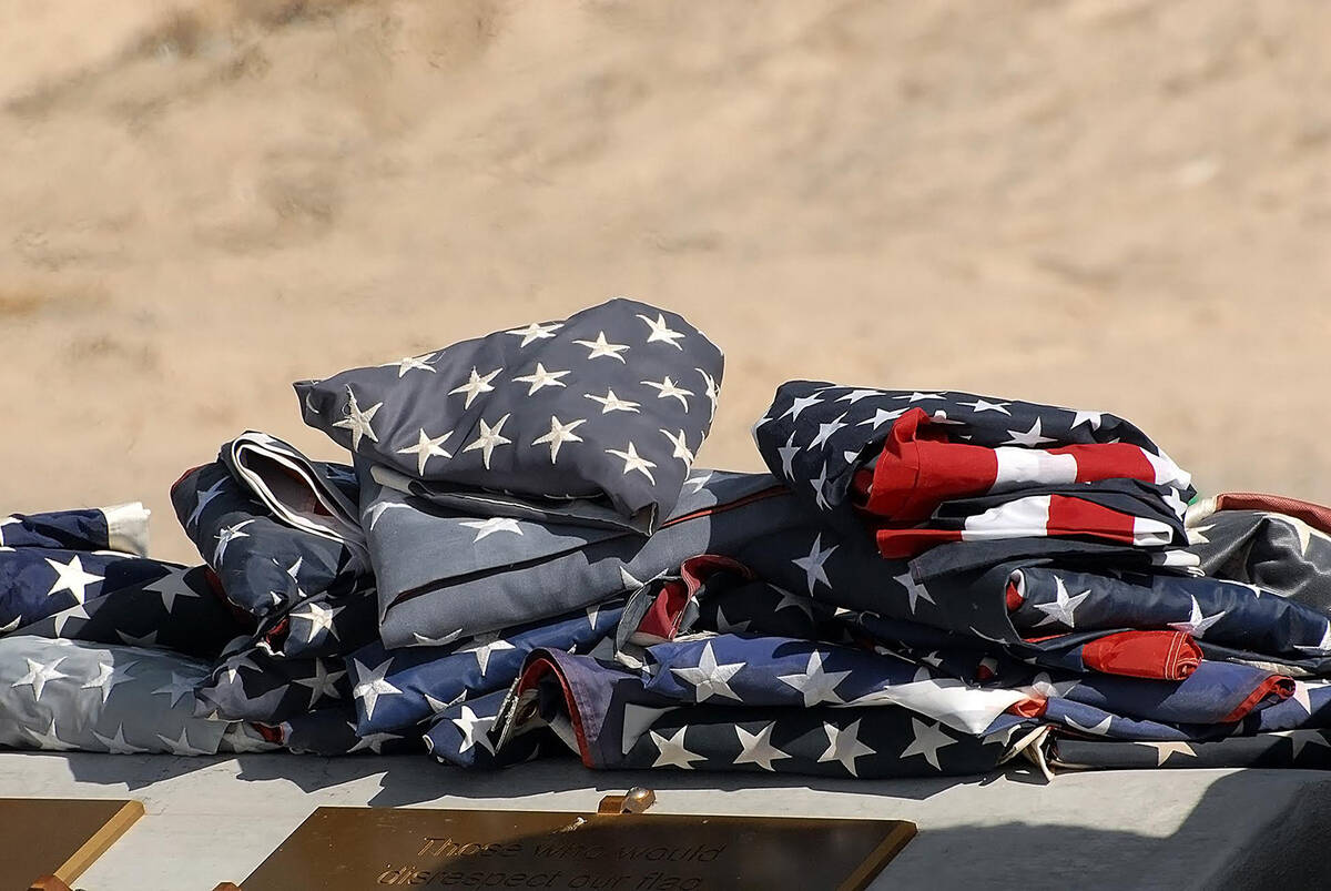 Horace Langford Jr./Pahrump Valley Times Dirty, dusty and torn, the American Flags shown here w ...